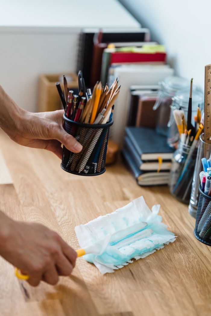 why-choose-us A clean, organized desk with stationery and dusting supplies for efficient workspace.